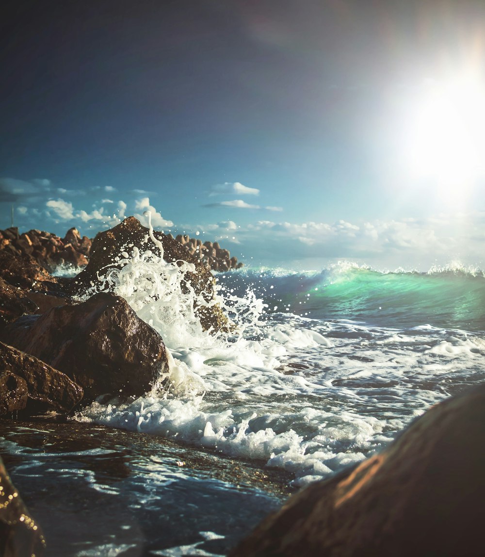 wave splashing on rocks