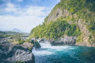 river near mountain at daytime chile teams background