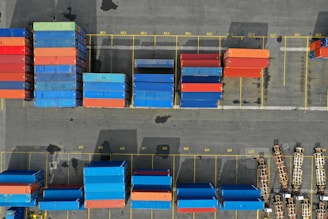 an overhead view of a warehouse filled with containers