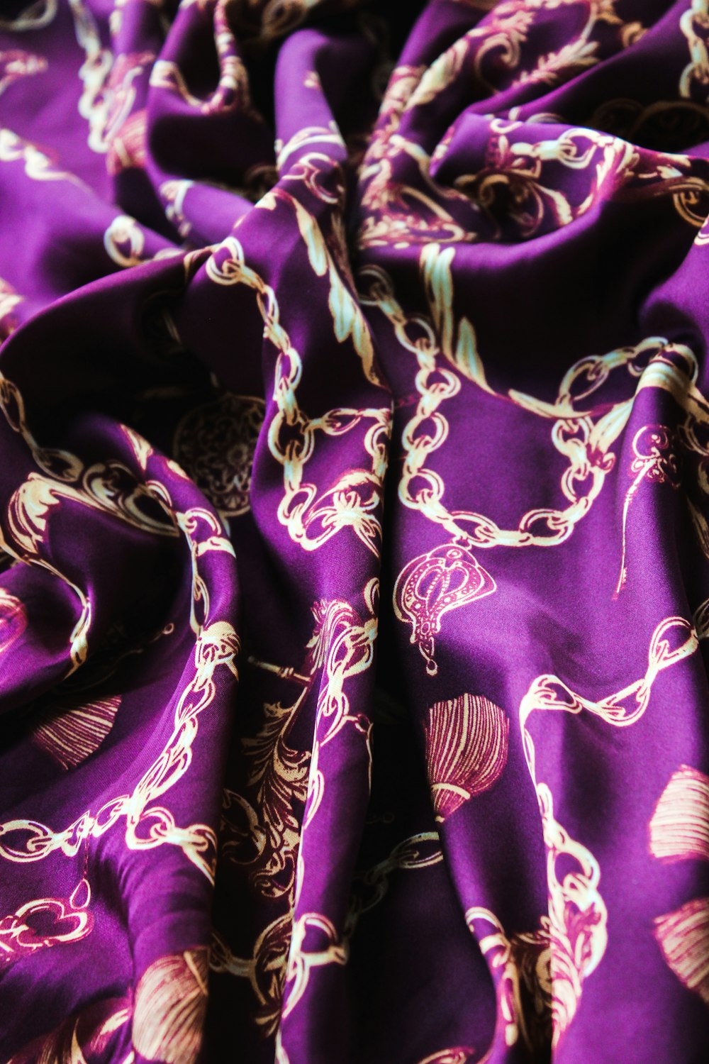 purple and white textile