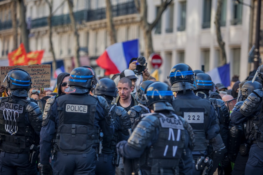 police facing people in road