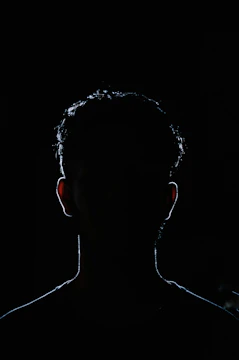 Mysterious silhouette of Imu with dark shadows and glowing eyes
