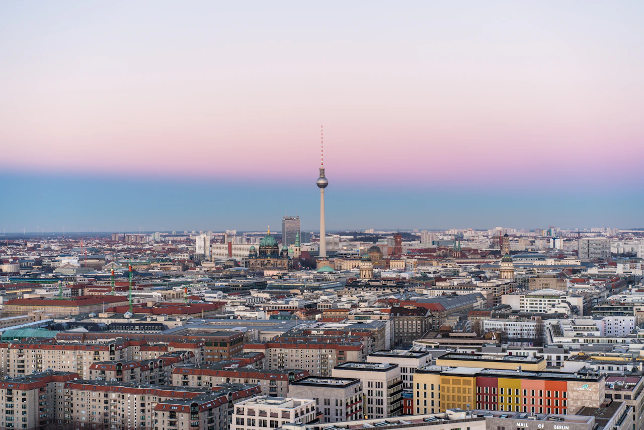 Berlin skyline at dusk with the Fernsehturm TV Tower rising above the city