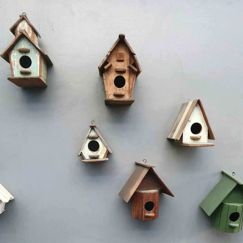 assorted-color wooden birdhouse