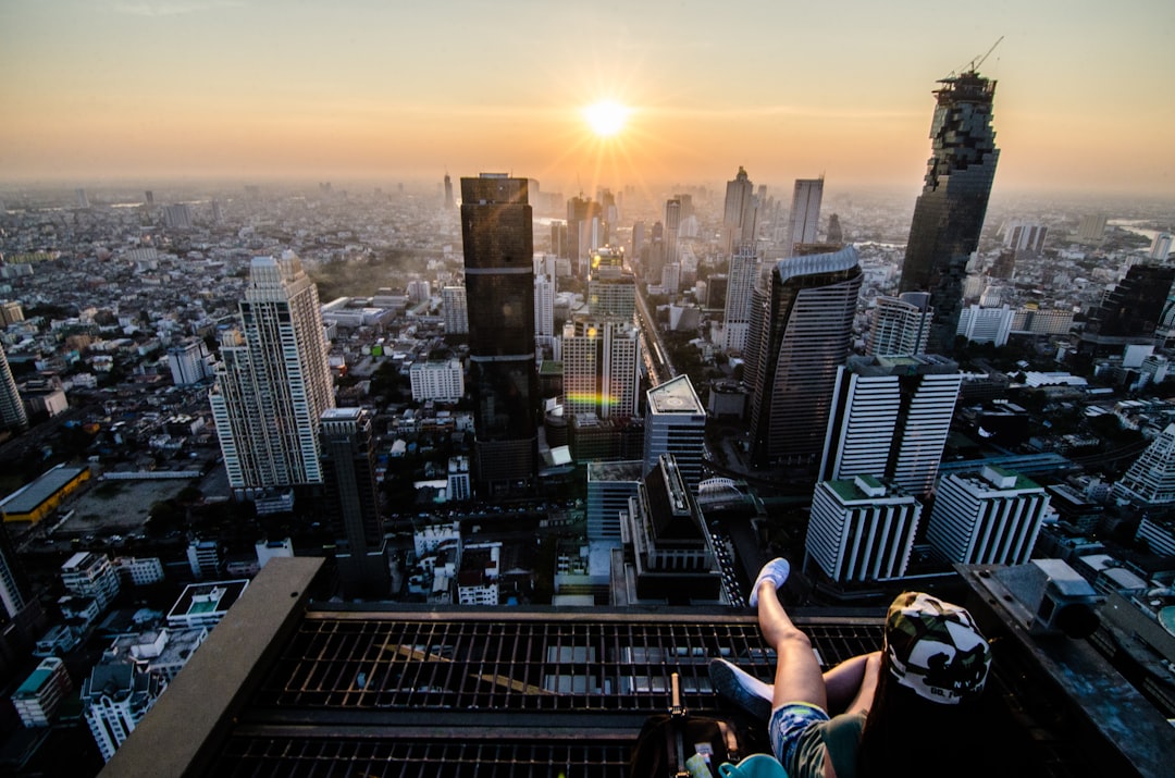 I believe that the best views in cities are totally free. If someone tries to charge for rooftop or viewpoint, just go away. 
Look around, be inventible, try to find another way and you will be surprised even if you don’t get the same point!