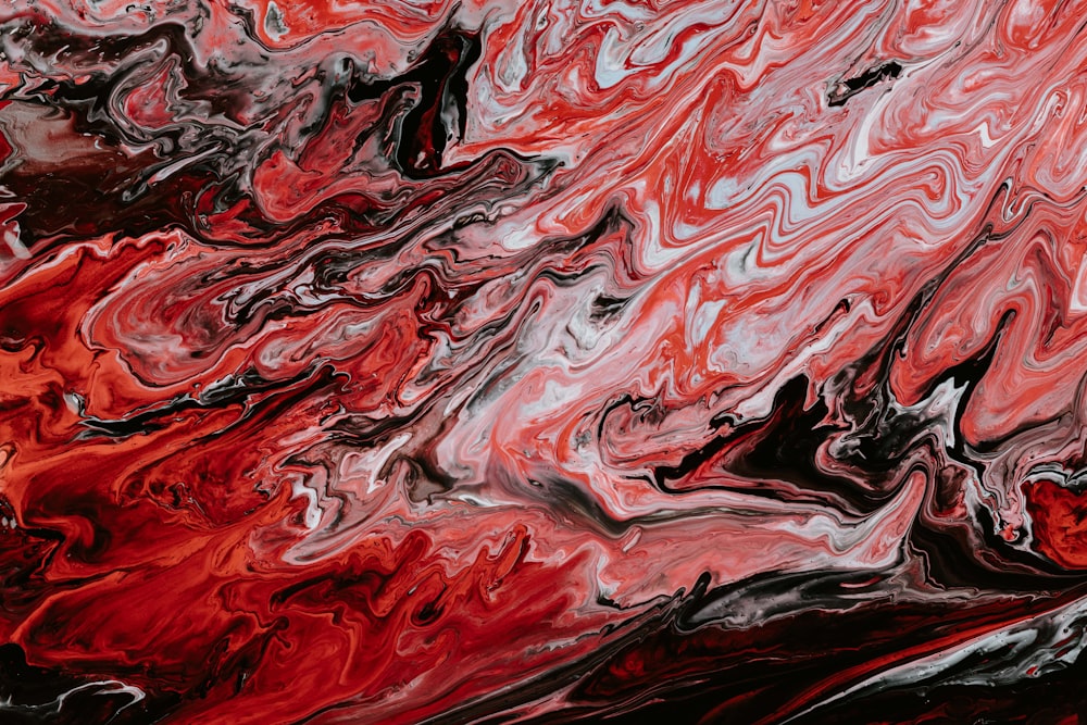 red, white and black abstract painting