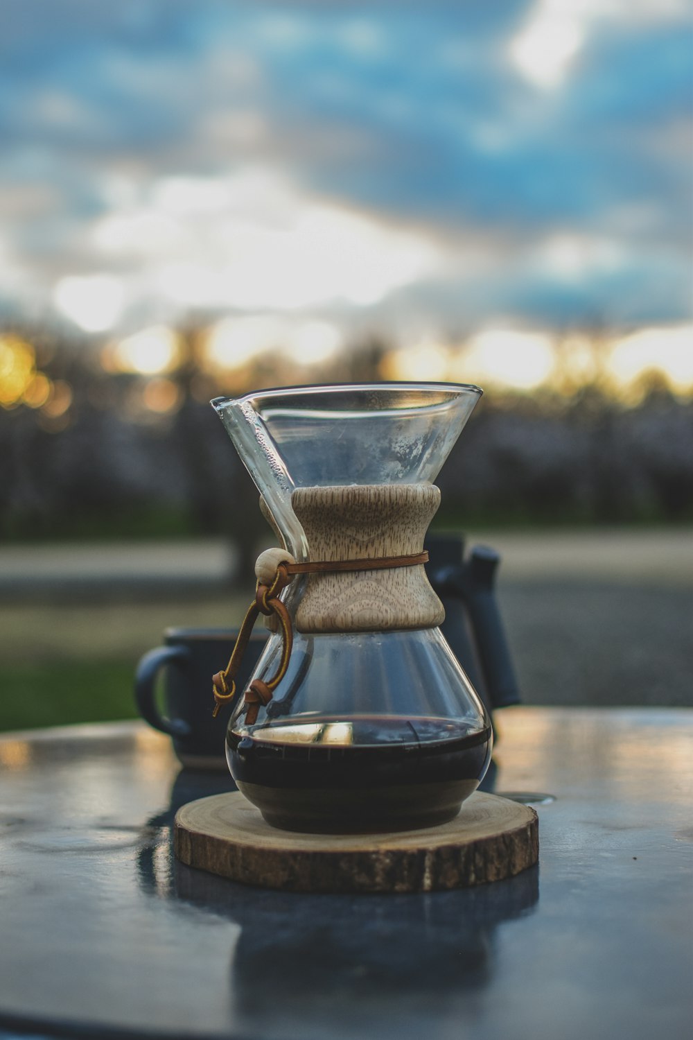 selective focus photography of clear glass coffee jar