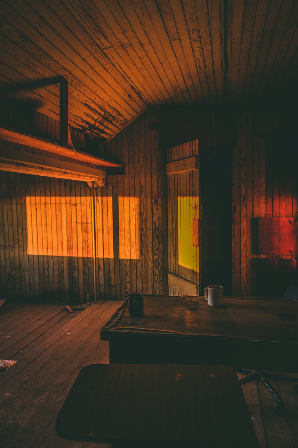 wooden tables inside wooden room