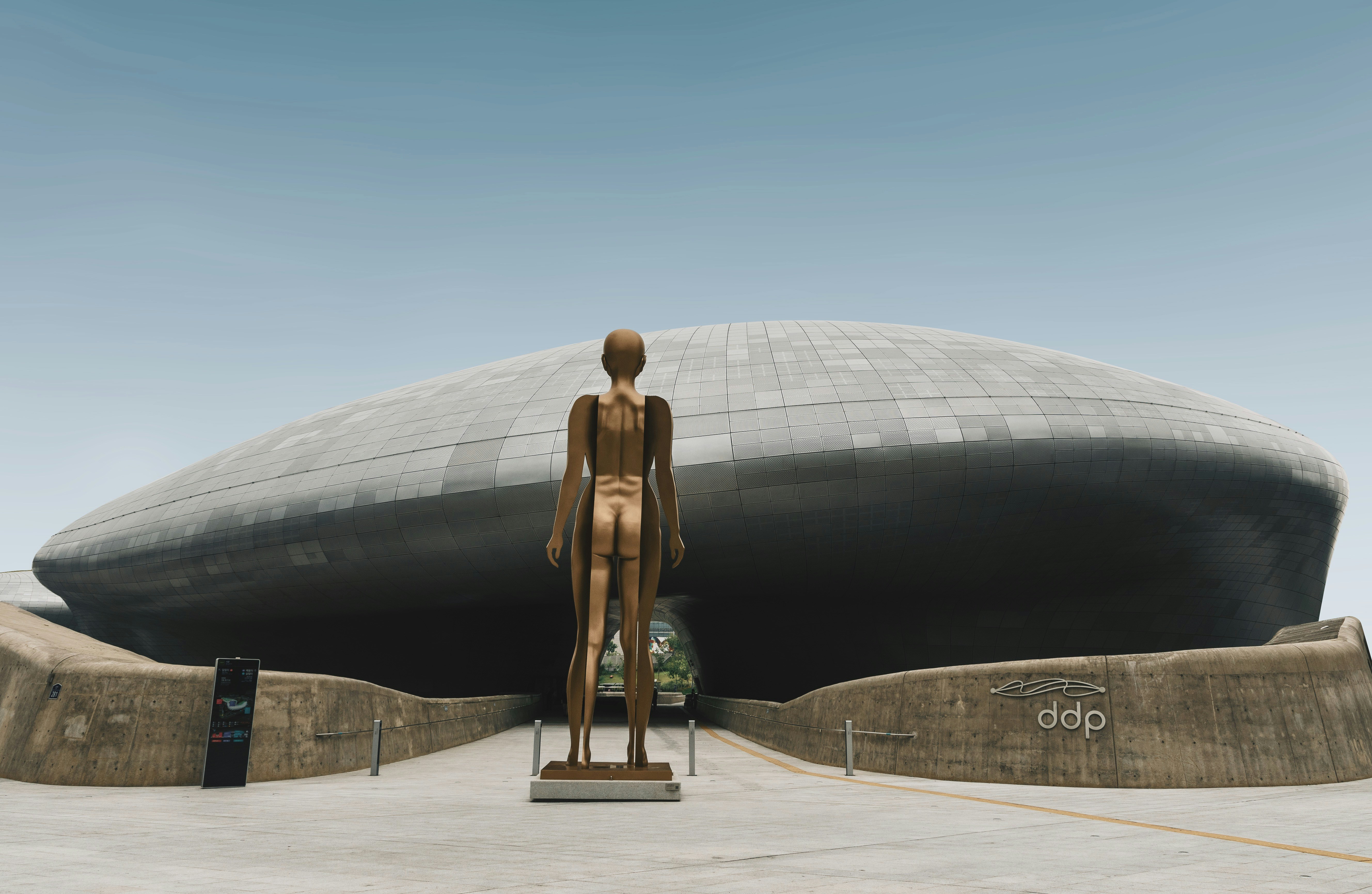 A single, brightly colored shape moving effortlessly through a dense field of uniform grey shapes.