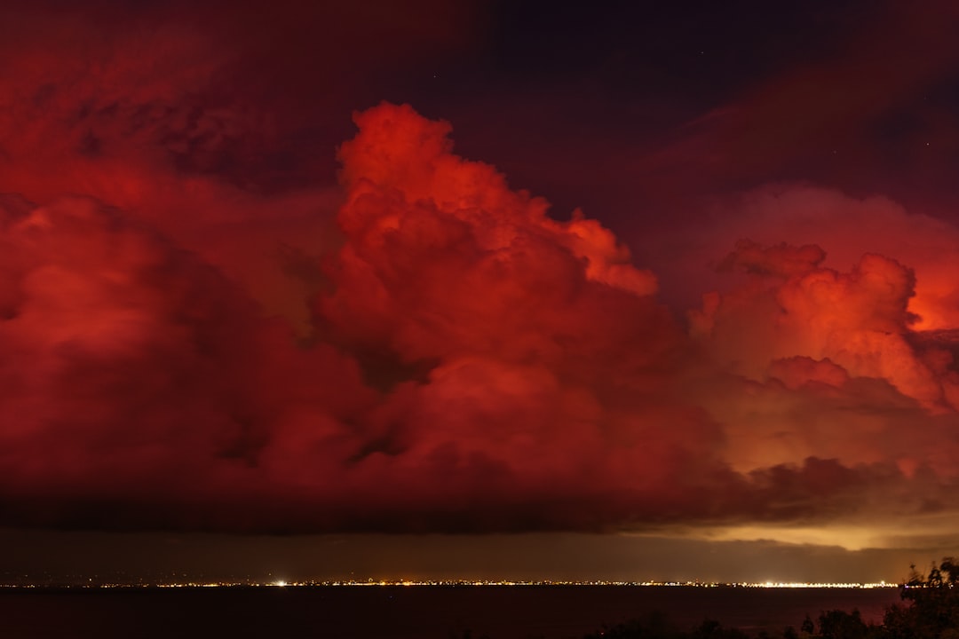 white cloud over body of water