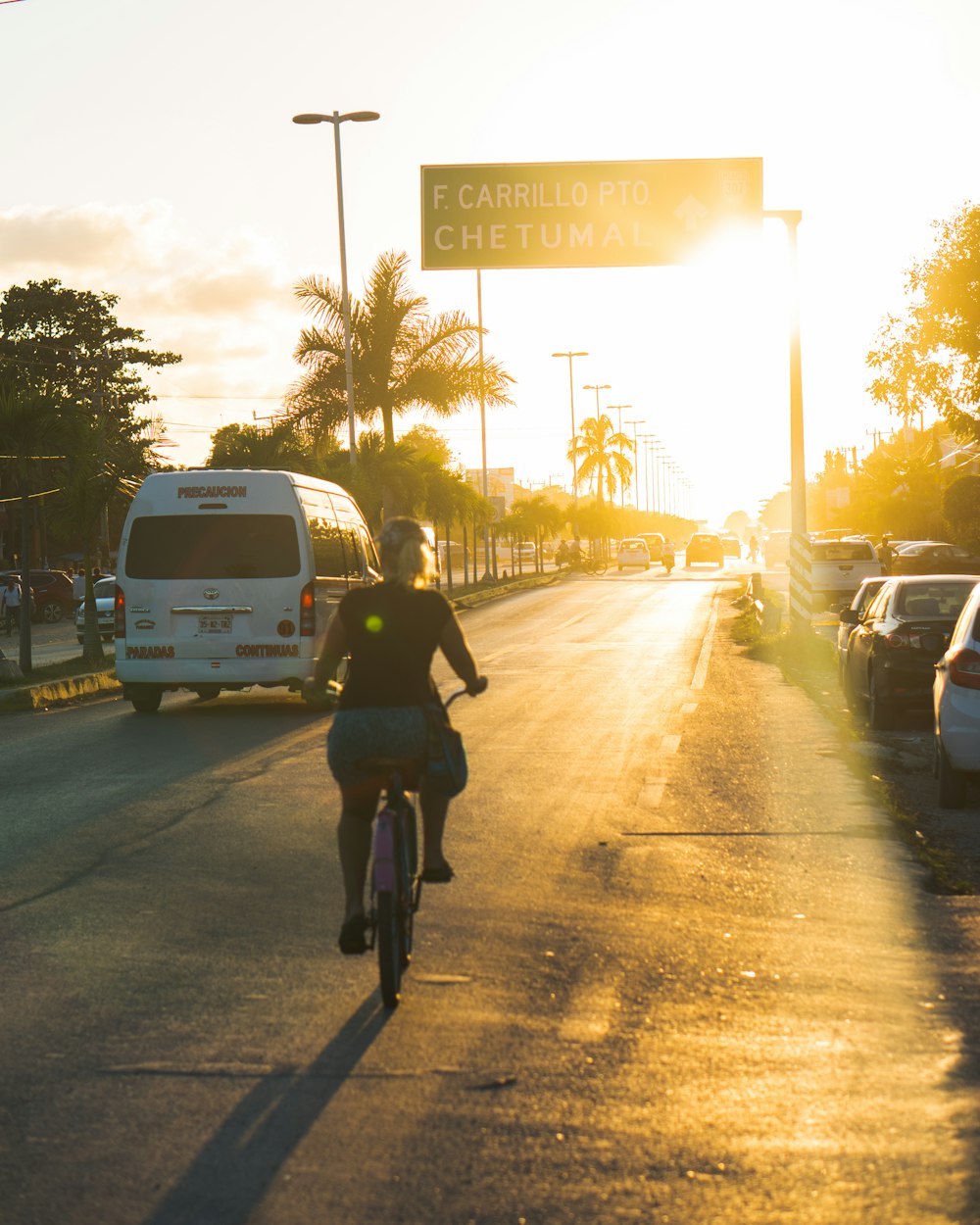 woman riding bicyle during day time