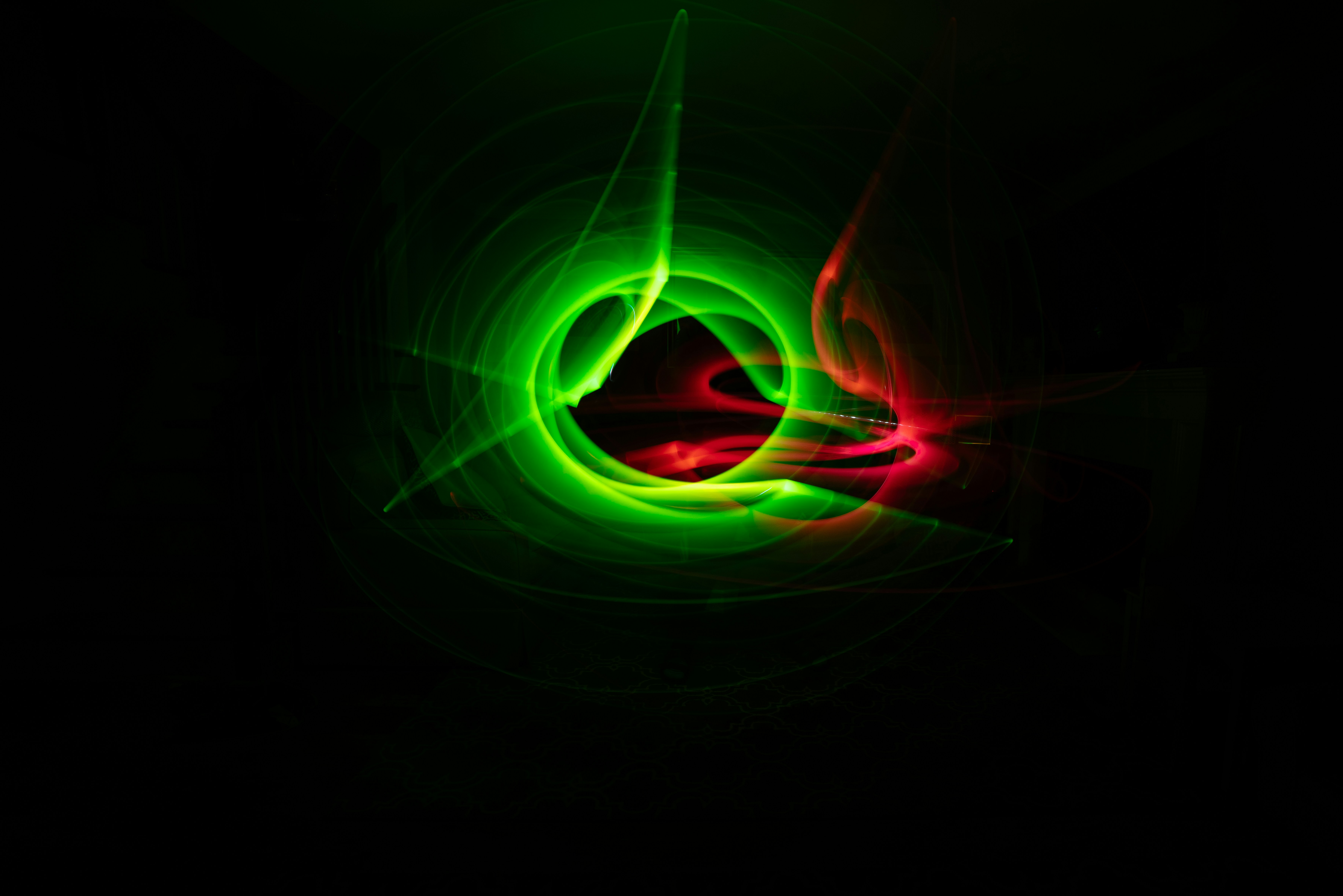 red, black, and green digital wallpaper