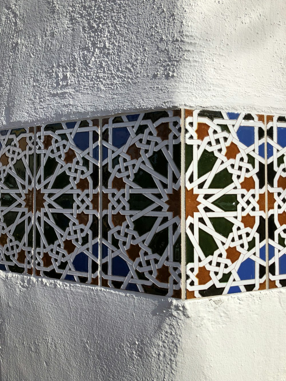 a close up of a wall with a pattern on it