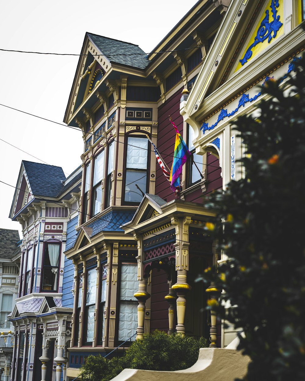 red, yellow, and blue house during daytime