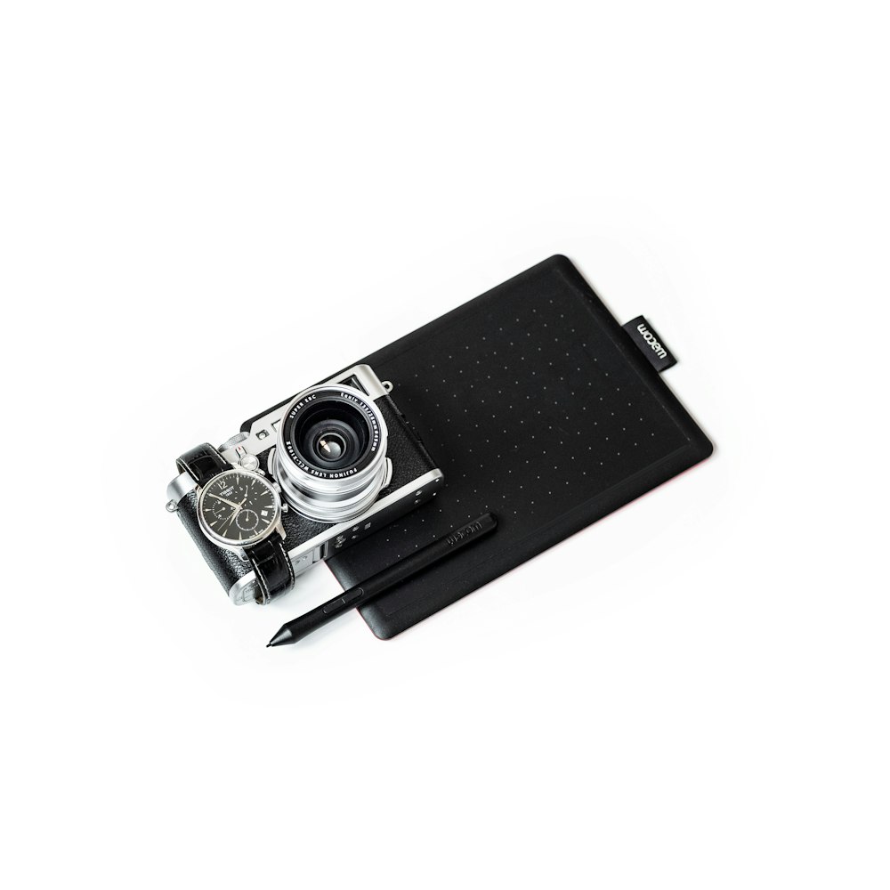 black and white bridge camera near watch