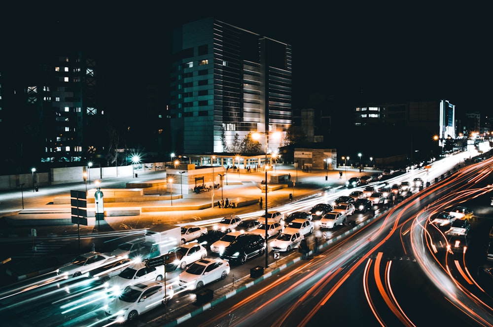 time lapse photography of cars on road during night time