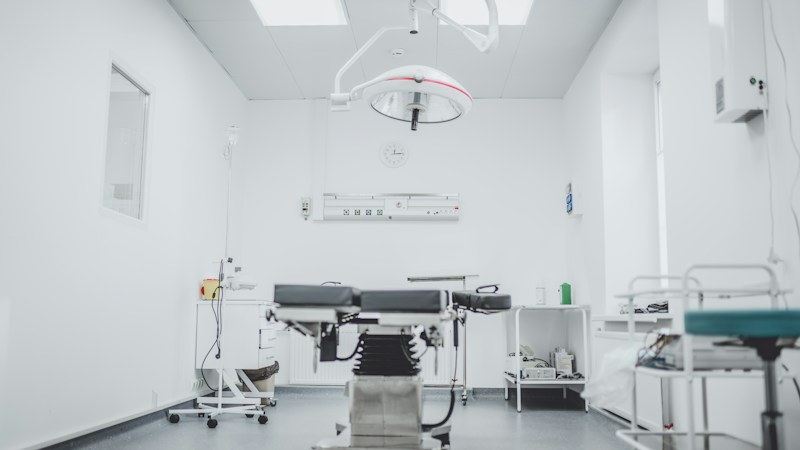 Medical professional reviewing data representing healthcare SEO strategy and YMYL compliance