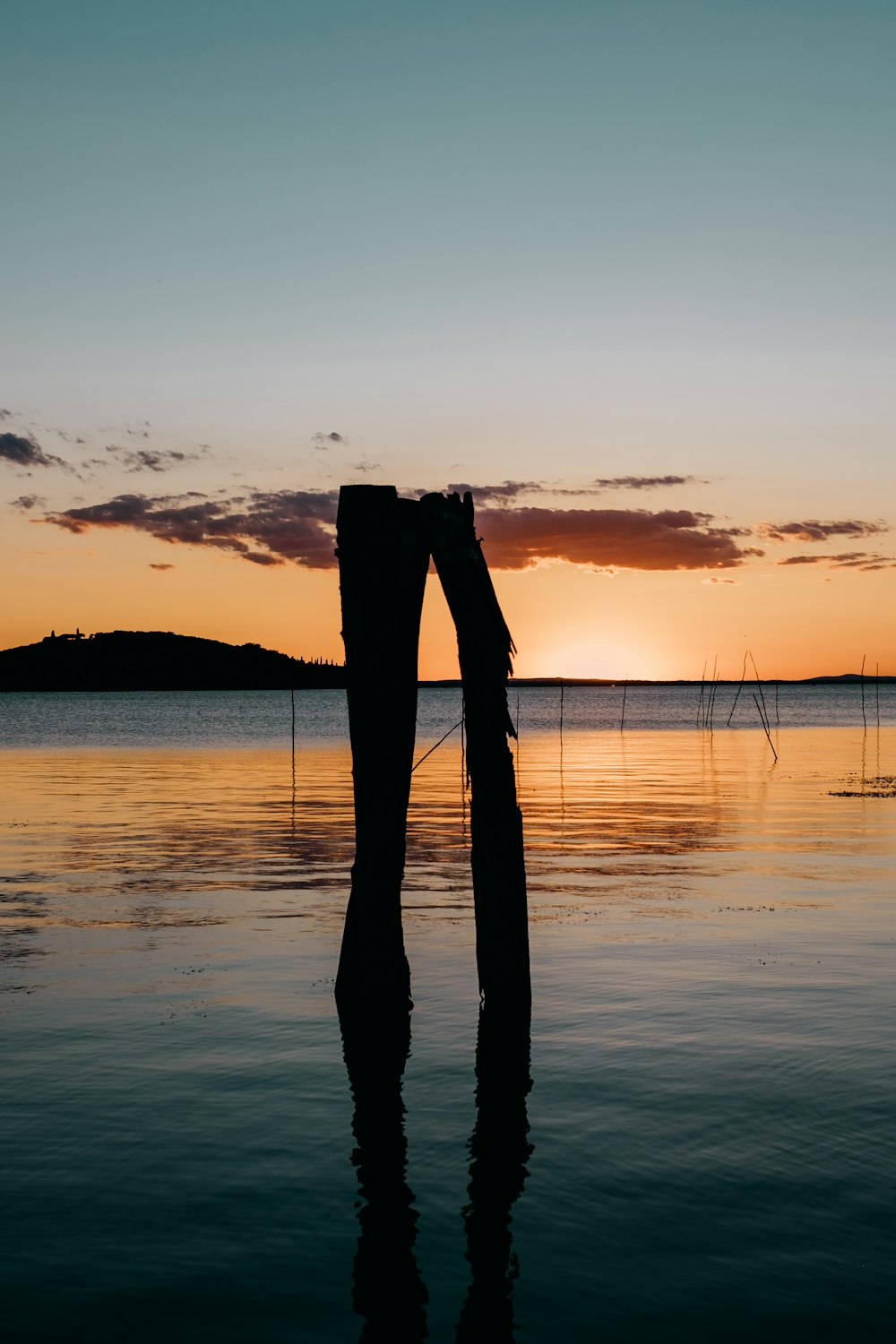 body of water during golden hour