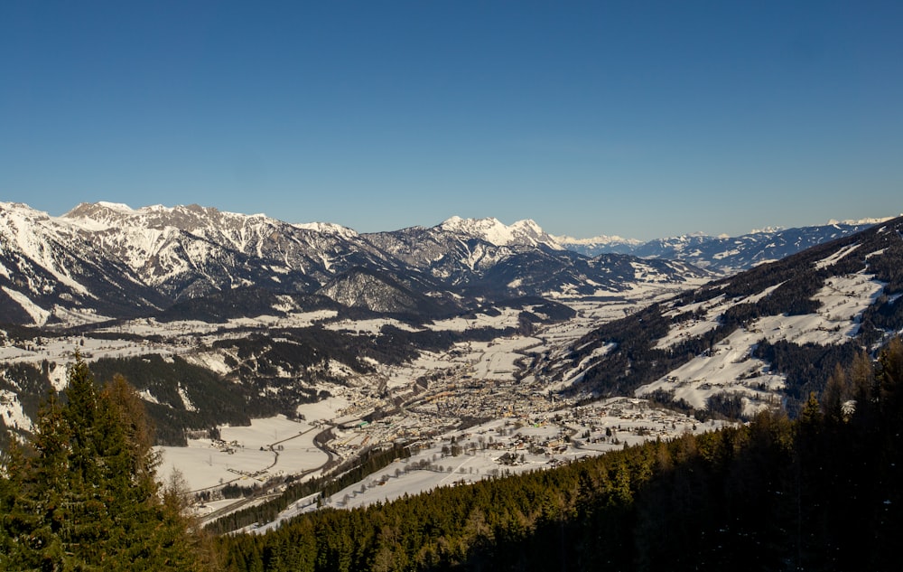 landscape photo of snow covered mountains during daytime