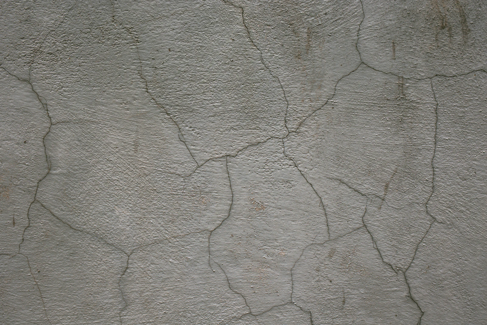 Cracked wall surface showing structural stress lines