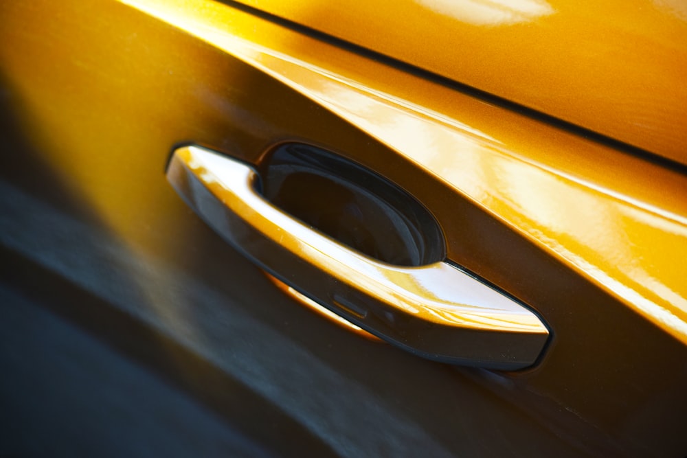 yellow vehicle door lever