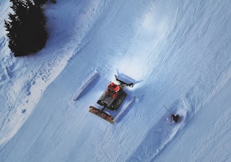 snow vehicle on snow covered field