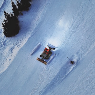 snow vehicle on snow covered field