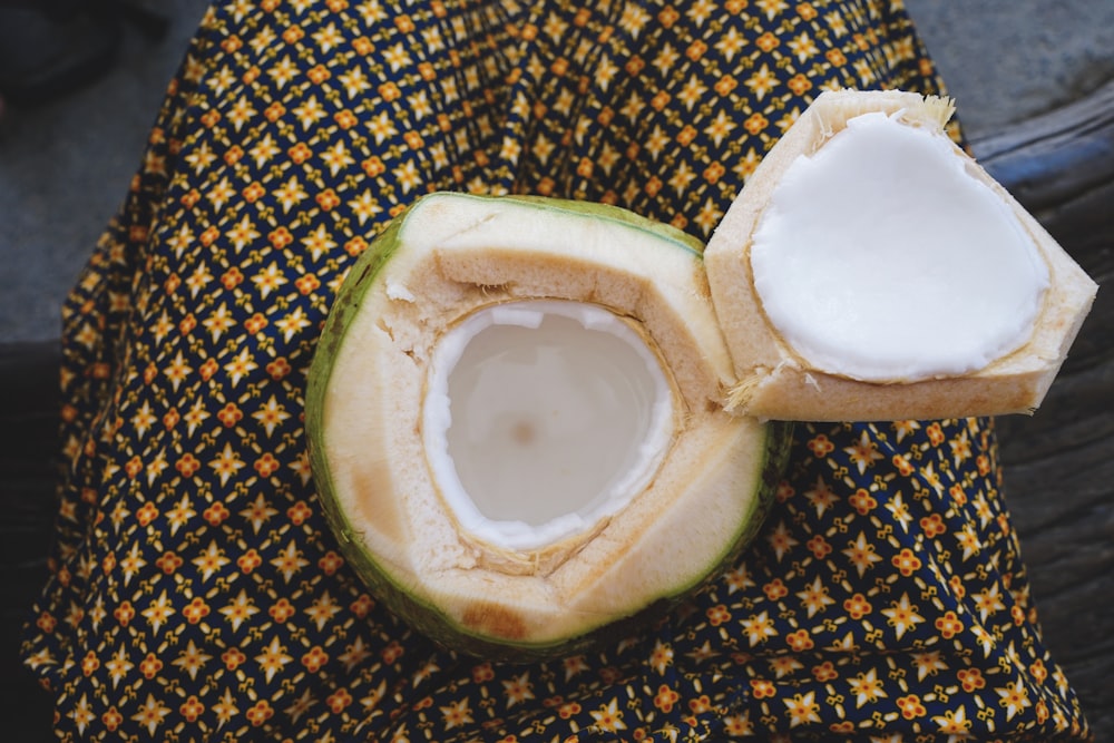 coconut meat on person's lap