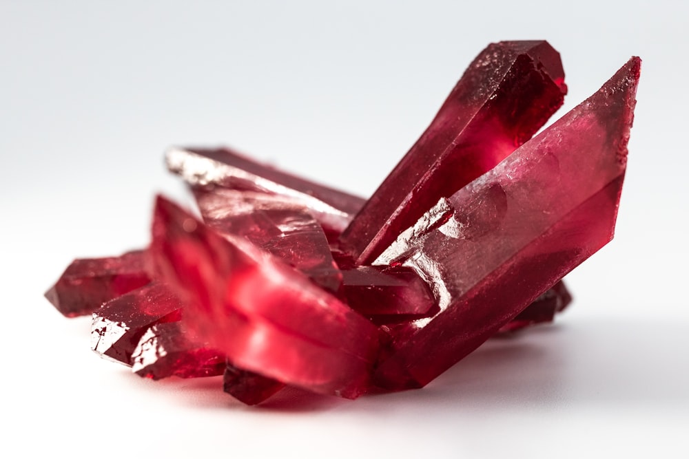 selective focus photo of red gemstone