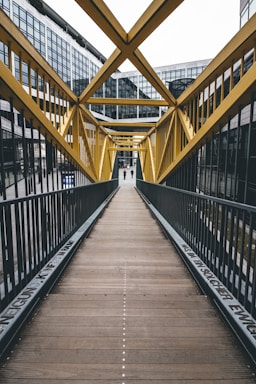 leading lines for photo composition,how to photograph brown wooden bridge