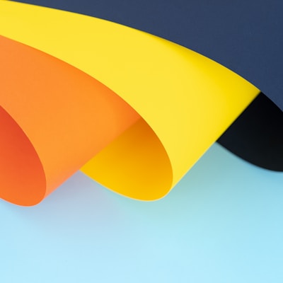 orange, yellow and blue papers