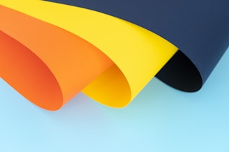 orange, yellow and blue papers