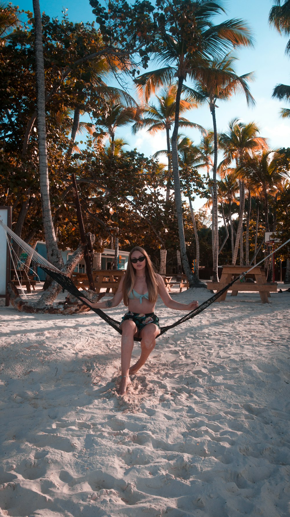 woman sitting on hammock