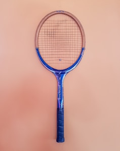 blue and brown tennis racket