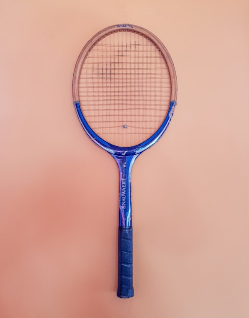 blue and brown tennis racket