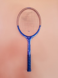 blue and brown tennis racket