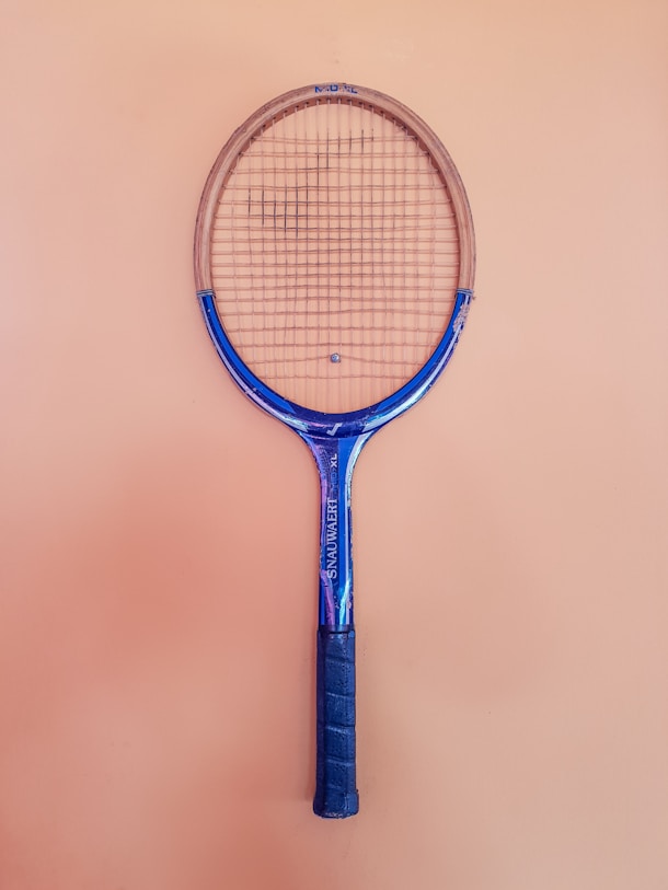 blue and brown tennis racket