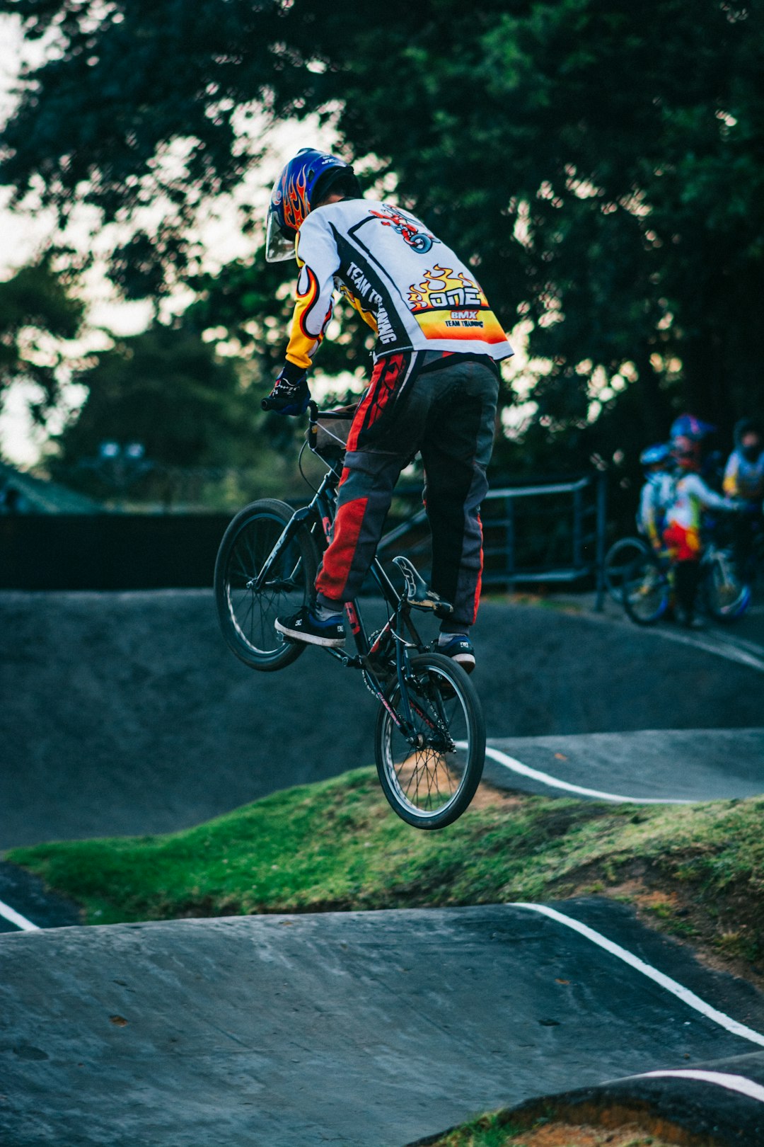 man riding on bicycle while doing freestyle