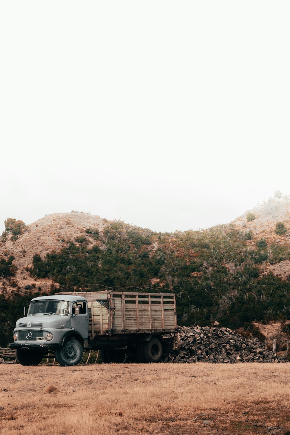 stake truck near hill