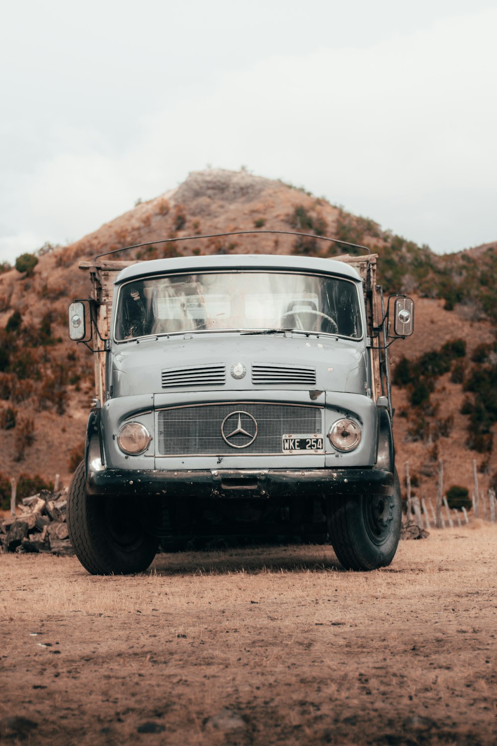 parked gray Mercedes-Benz truck during daytime