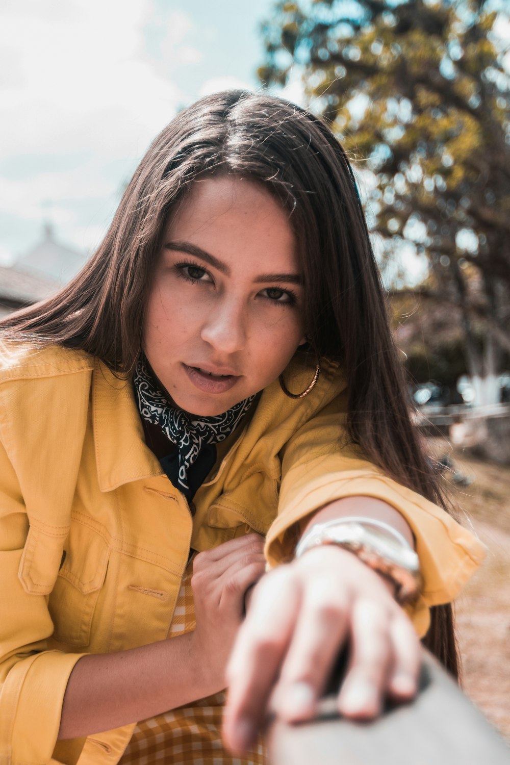 woman wearing yellow jacket