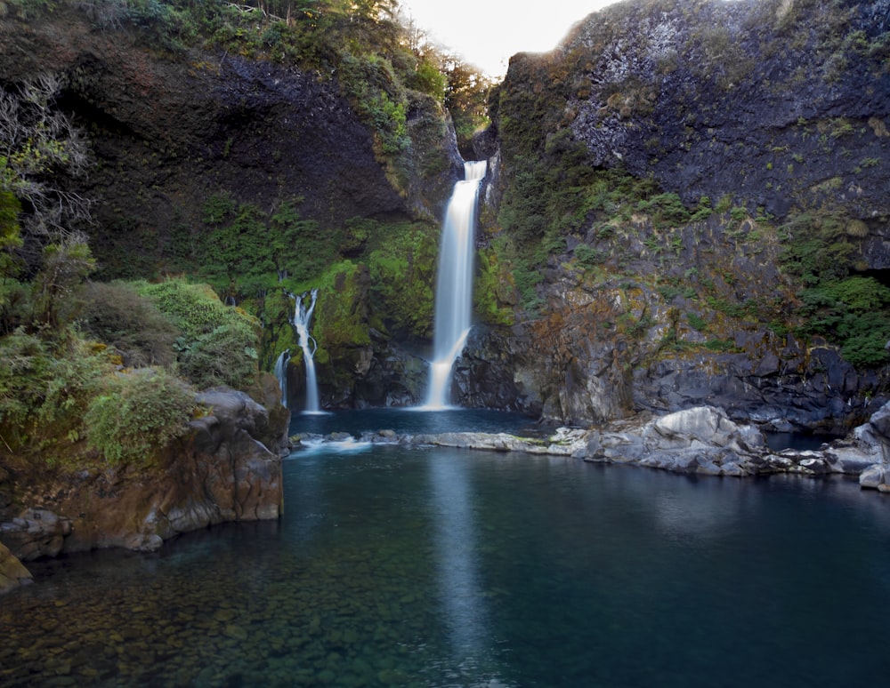 flowing waterfalls during daytime