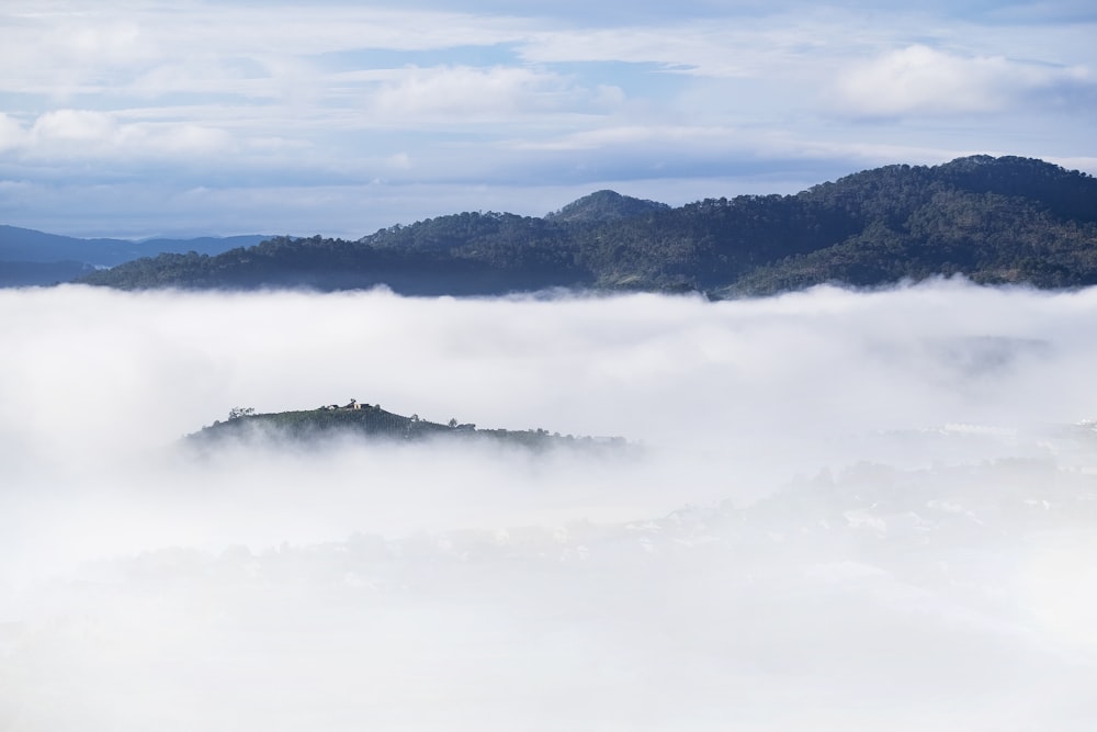 foggy mountain during daytime