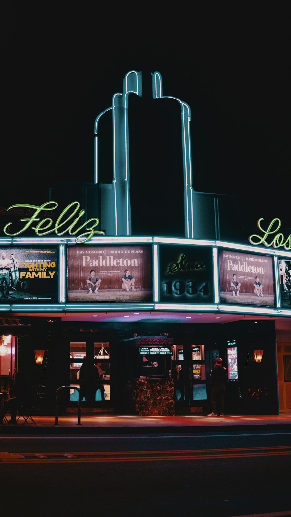 lighted Feliz establishment at night