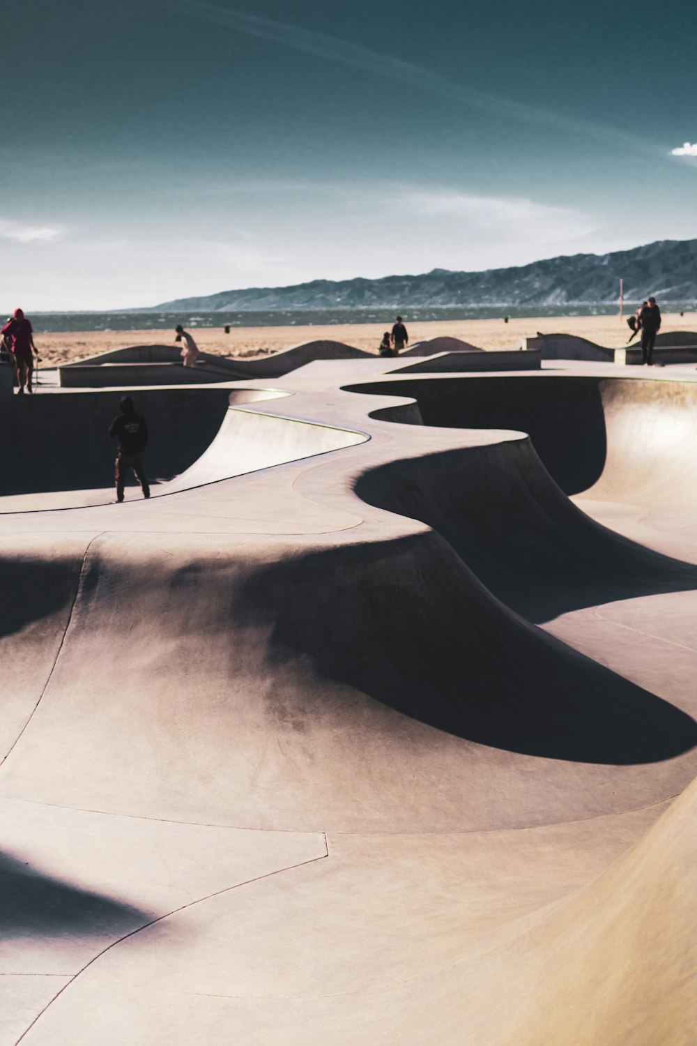 person standing in the middle of skatepark