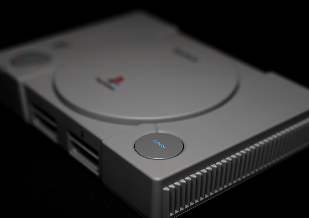 Photo of closed Sony PS1 with DualShock 1 photo – Free Grey Image on  Unsplash