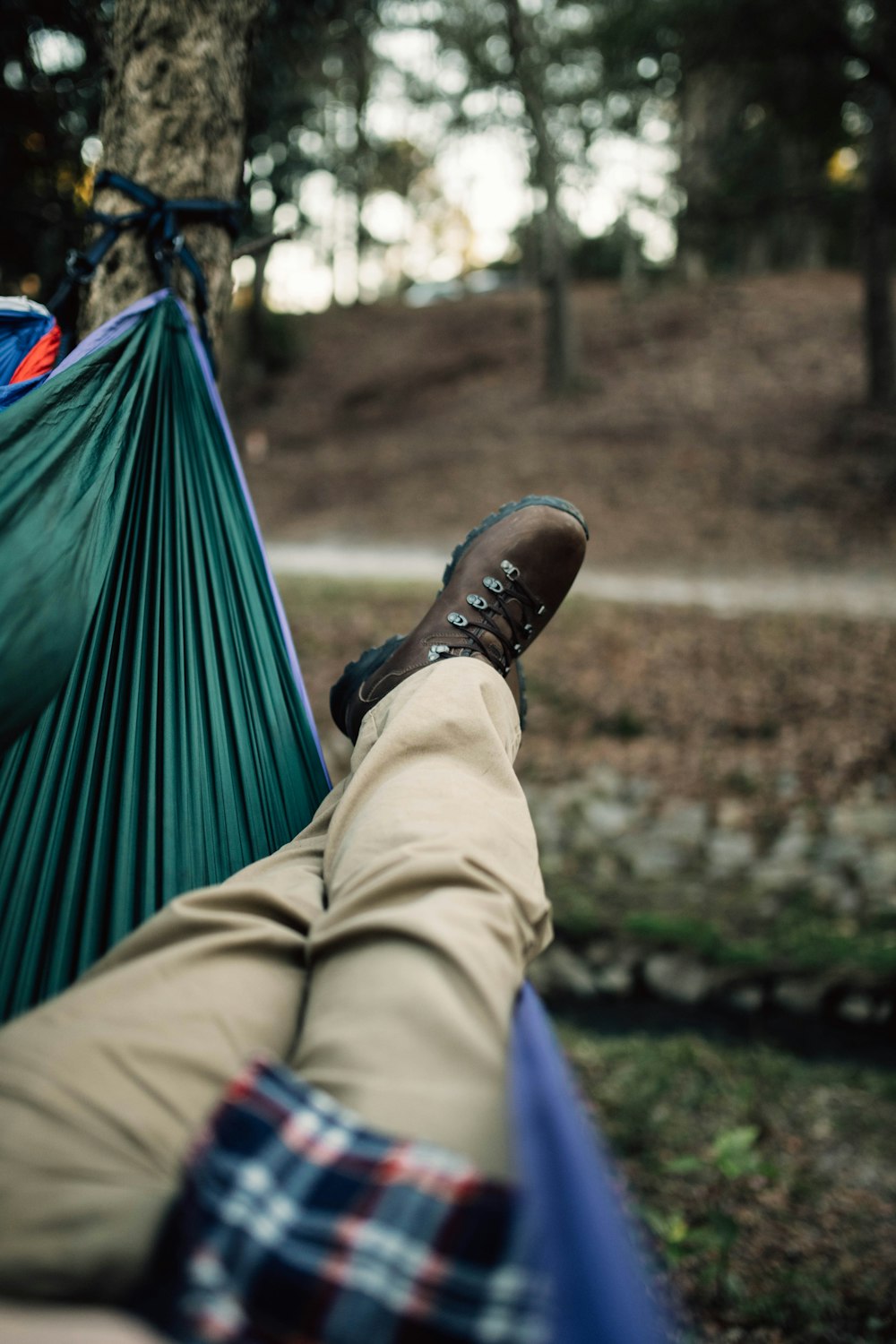 man lying on hammock