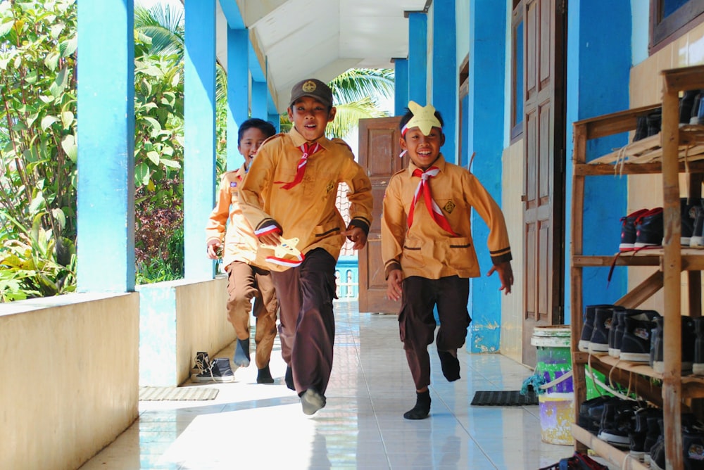 boys running on hallway