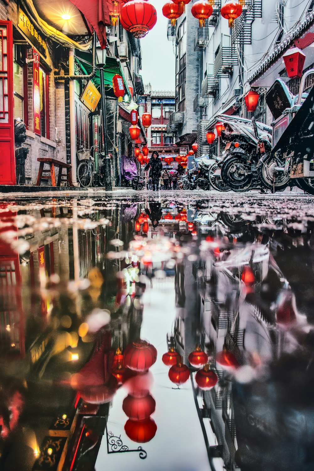 woman walking towards motorcyles