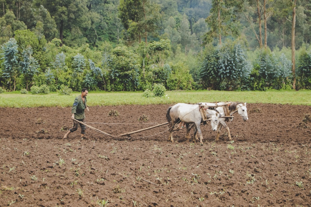 man doing flowing soil